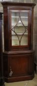 A George III style mahogany standing corner cupboard, W.86cm, D.52cm, H.191cm