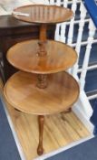 A George III style mahogany three tier dumb waiter, H.100cm