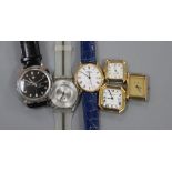 Six assorted wrist watches including Raymond Weil and Roamer.