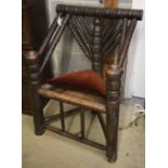 A 19th century turner's chair, with triangular seat and ball-turned spars to back