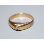 A yellow metal and gypsy set solitaire old cut diamond ring, size Q, gross 4.9 grams.