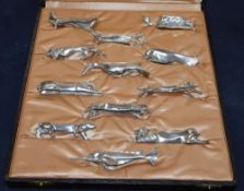 A cased set of twelve Gallia for Christofle Art Deco silver plated knife rests, designed by