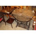 An 18th century style oak gateleg occasional table, W.66cm, D.38cm, H.70cm together with an