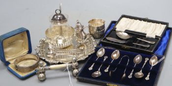 A silver circular waiter and sundry other silver items, including six silver coffee spoons and sugar