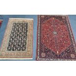 A North West Persian red ground rug together with a smaller Boteh part silk mat, larger 154 x 100cm