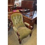 A Victorian spoonback open armchair and an Edwardian mahogany Sutherland table