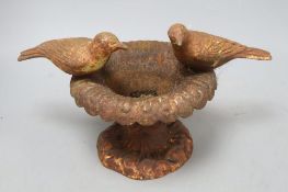 A cast iron bird bath, "Doves of Pliny", height 21cm