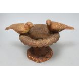 A cast iron bird bath, "Doves of Pliny", height 21cm