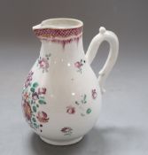 A Chinese export famille rose jug, height 14cmCONDITION: There is a hairline crack reaching over the