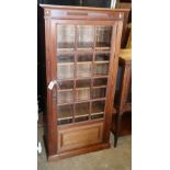 An early 20th century French walnut glazed display cabinet, W.70cm, D.36cm, H.140cm