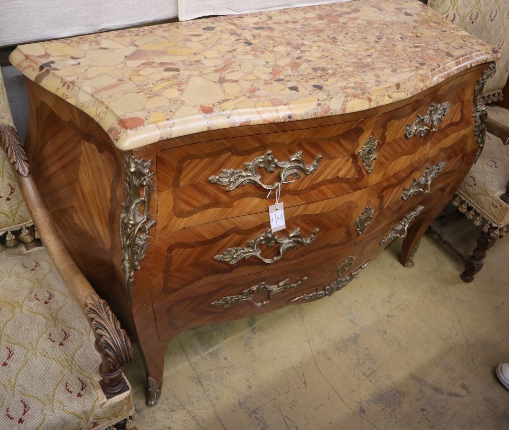 A Louis XV style parquetry marble top serpentine bombe commode, W.128cm, D.52cm, H.92cmCONDITION: