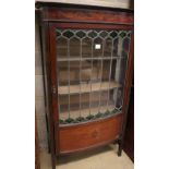 An Edwardian inlaid mahogany and stained glass bow-fronted display cabinet, W.85cm, D.41cm, H.150cm