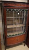 An Edwardian inlaid mahogany and stained glass bow-fronted display cabinet, W.85cm, D.41cm, H.150cm