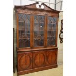 Charles Barr Furniture, A Sheraton-style mahogany library bookcase with swan-neck pediment, W.154cm,