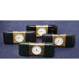 Four Nepro gilt metal cased purse alarm watches, with easel backs, each 56mm., three with leather