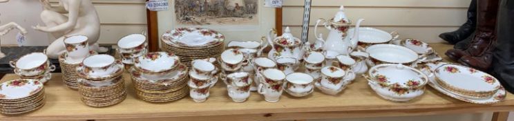 A large collection of Royal Albert Old Country Roses tableware, comprising teapot and cover,
