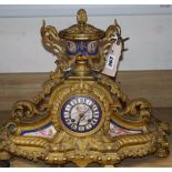 A late 19th / early 20th century French gilt metal and enamel mantel clock, height 36cm