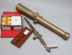 A replica brass cannon, a replica 'jewelled' dagger (a.f), a 'Klik' bridge marker and a cased game