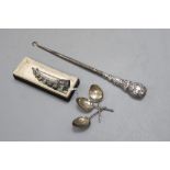 A Chinese silver and hardstone finger ornament with brooch pin, a buttonhook and a set of three
