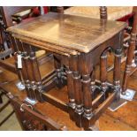 A nest of three rectangular oak tables, W.53cm, D.33cm, H.47cm