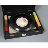 A cased roulette set