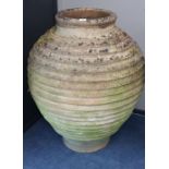 A large Grecian style weathered terracotta oil jar, H.95cmCONDITION: Nicely weathered throughout