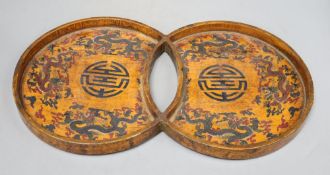 A 19th/20th century Chinese double circular wood and lacquer tray, length 42cm