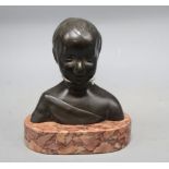 A bronze bust of a child, on marble base, unsigned, overall height 17cm