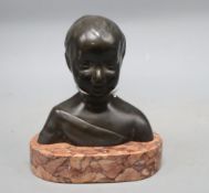 A bronze bust of a child, on marble base, unsigned, overall height 17cm