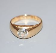 A Victorian 18ct gold and gypsy set old mine cut solitaire diamond ring, size T, gross 7.6 grams, (