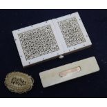 A Regency yellow metal mounted ivory toothpick case, a pierced card case, length 10.5cm and brooch