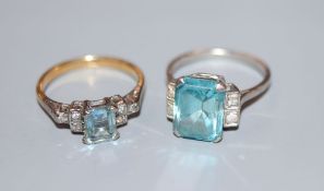 A white metal (stamped plat), blue zircon and diamond set dress ring, size L/M and an 18ct and plat,