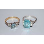 A white metal (stamped plat), blue zircon and diamond set dress ring, size L/M and an 18ct and plat,