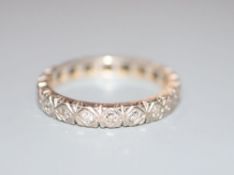 A modern 18ct white gold and diamond set full eternity ring, size M, gross 3.5 grams.CONDITION: Wear