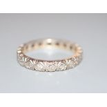 A modern 18ct white gold and diamond set full eternity ring, size M, gross 3.5 grams.CONDITION: Wear