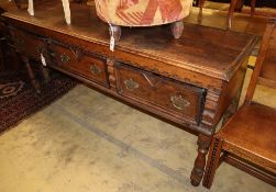 An 17th/18th century oak dresser base, W.182cm, D.50cm, H.82cm