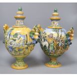 A pair of Italian maiolica vases and covers, height 37cm