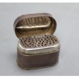 A George III silver oval nutmeg grater, ?B over JM, London, 1806, 34mm.CONDITION: Quite tarnished