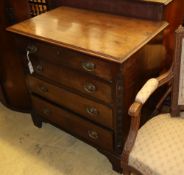 An 18th century mahogany chest with canted corners and oval handles, W.84cm, D.53cm, H.62cm