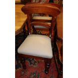 A set of eight Victorian-style mahogany dining chairs