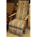 A Grieves & Thomas Bodyline beech reclining chair