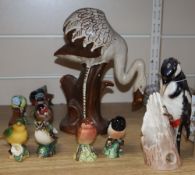 Ten Beswick birds, a David Sharp Rye pottery flamingo and a Goebel spotted woodpecker