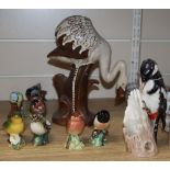 Ten Beswick birds, a David Sharp Rye pottery flamingo and a Goebel spotted woodpecker