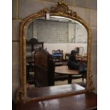 A Victorian gilt gesso overmantel, W.110cm, H.114cmCONDITION: There is an area of lost gesso to