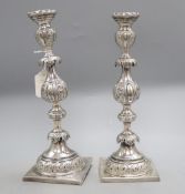 A pair of 19th century Russian 84 zolotnik Sabbath Day candlesticks, retailed by J. Goldman, dated