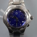 A lady's stainless steel Tag Heuer Professional quartz wrist watch, on stainless steel Tag