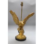 A gilt 'eagle' table lamp