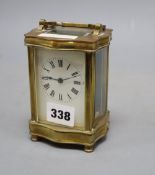 A brass carriage timepiece, height 13cm (handle down)