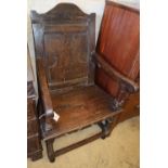 An 18th century and later oak Wainscot armchair, W.64cm, D.56cm, H.110cm