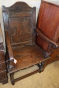 An 18th century and later oak Wainscot armchair, W.64cm, D.56cm, H.110cm